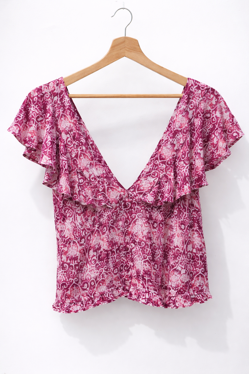 Blusa detalles rosados y blanco